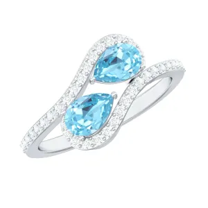 1.25 CT Pear Shape Aquamarine Two Stone Bypass Ring with Diamond Accent