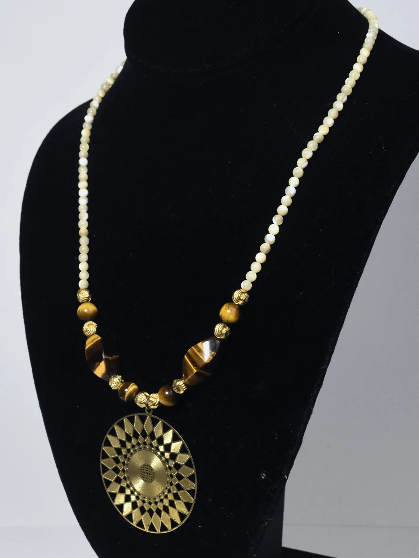 Carved Shell Bead, Brass and Tiger's Eye Necklace with Brass Pendant