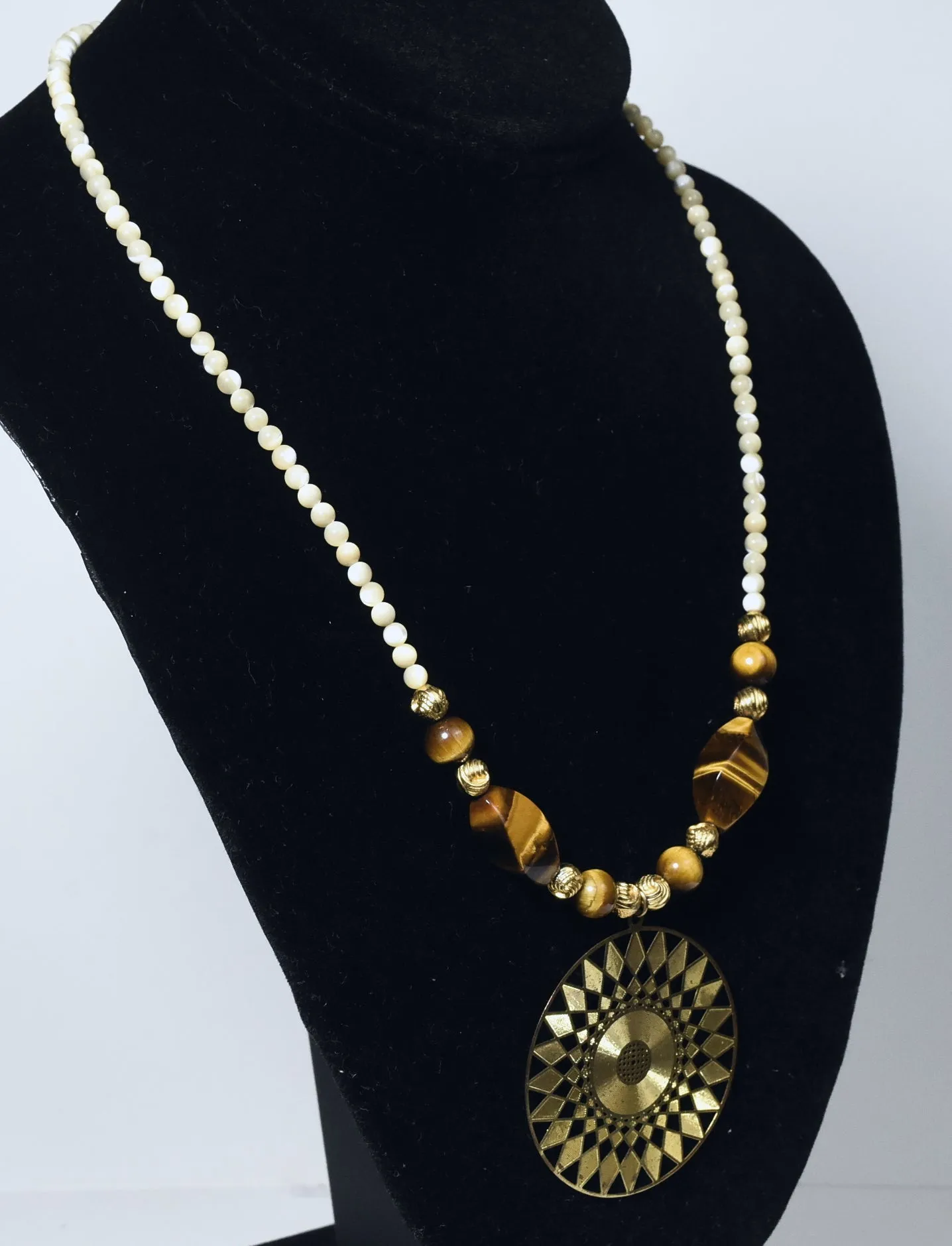 Carved Shell Bead, Brass and Tiger's Eye Necklace with Brass Pendant