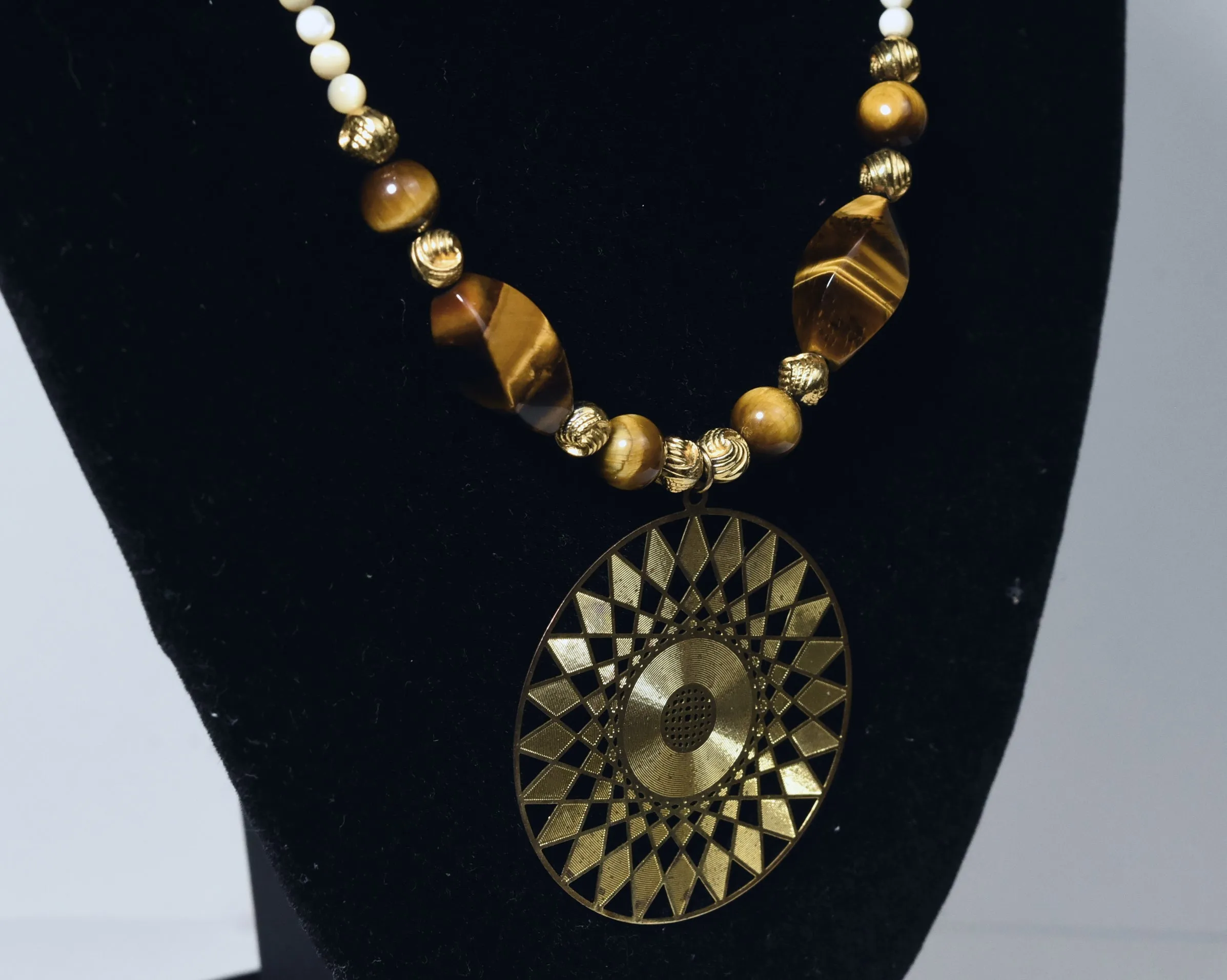 Carved Shell Bead, Brass and Tiger's Eye Necklace with Brass Pendant