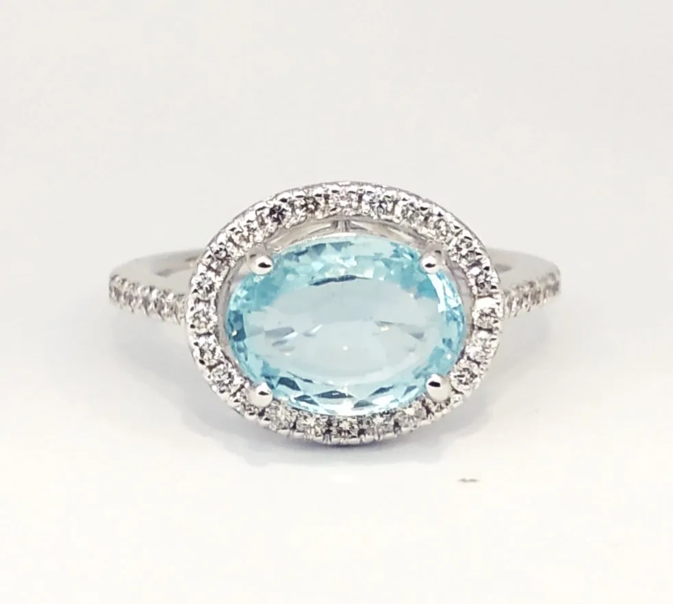 Oval Aquamarine With Round Diamond Halo Ring AD.NO- 2095