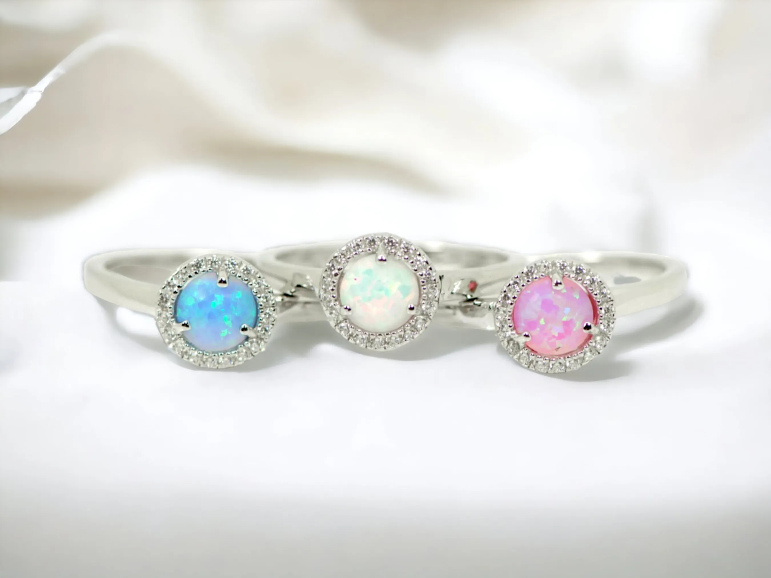 Sterling Silver Light Blue Opal and CZ Halo Ring