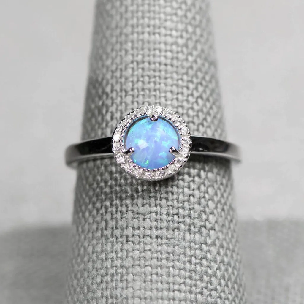 Sterling Silver Light Blue Opal and CZ Halo Ring