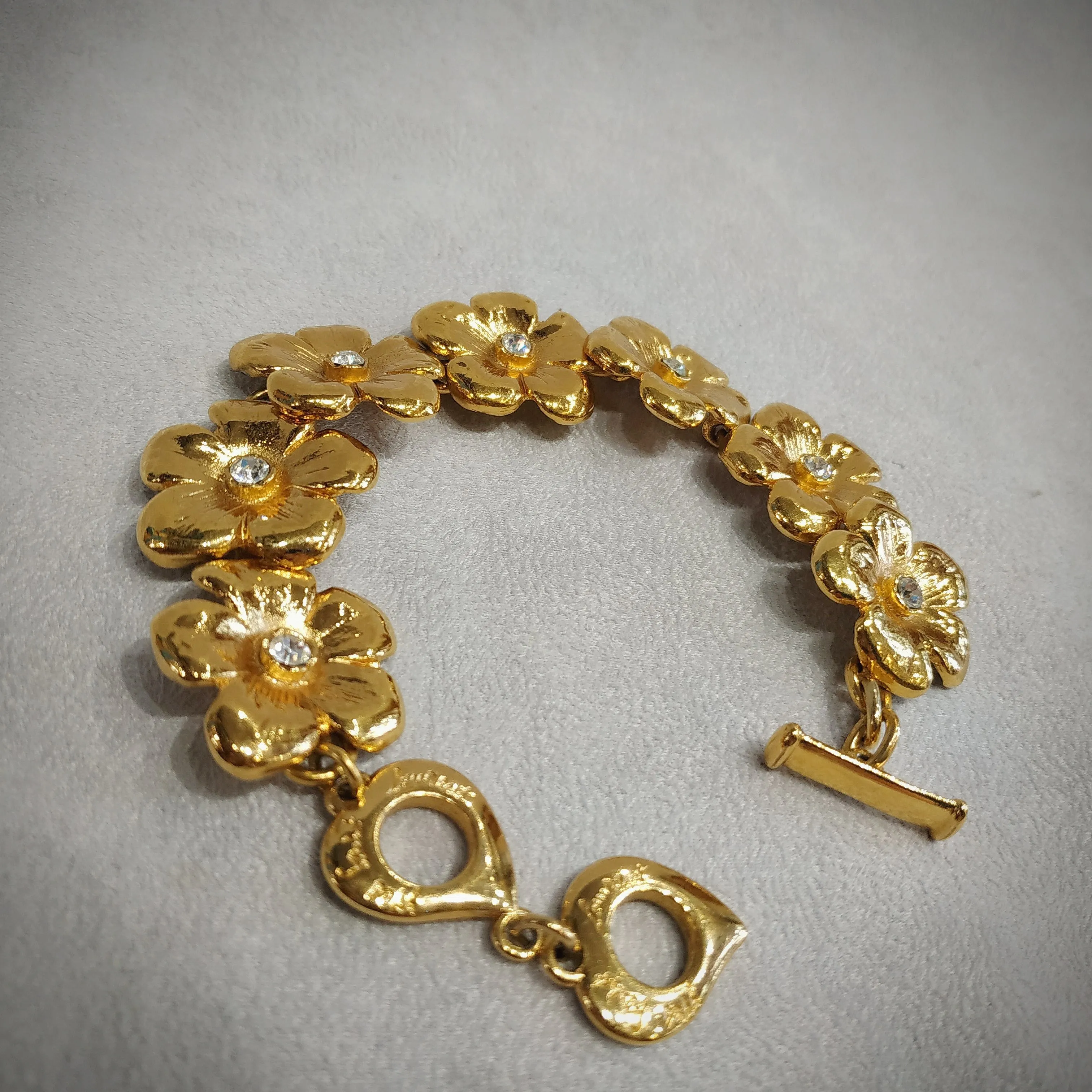 Yves Saint Laurent golden flower bracelet