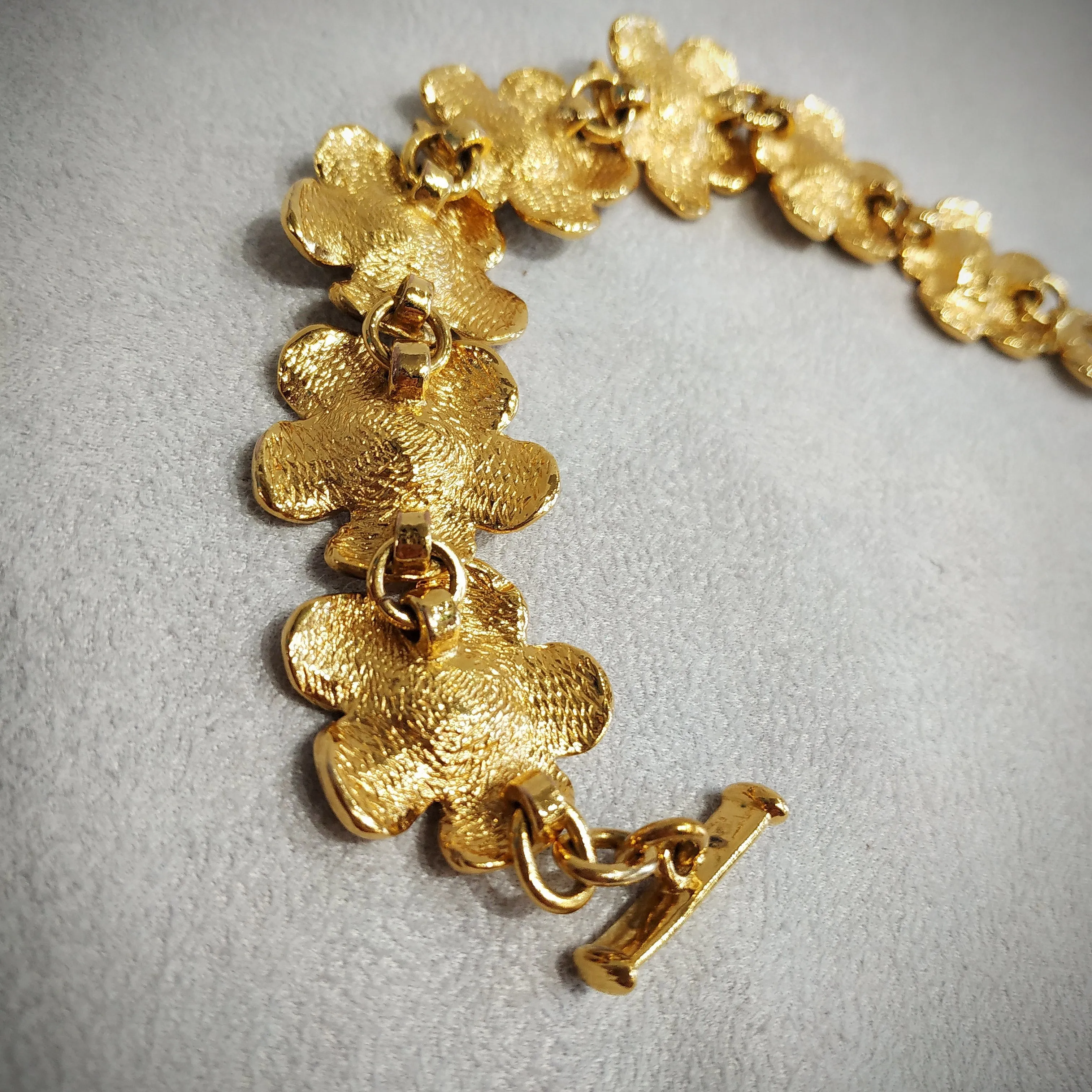 Yves Saint Laurent golden flower bracelet