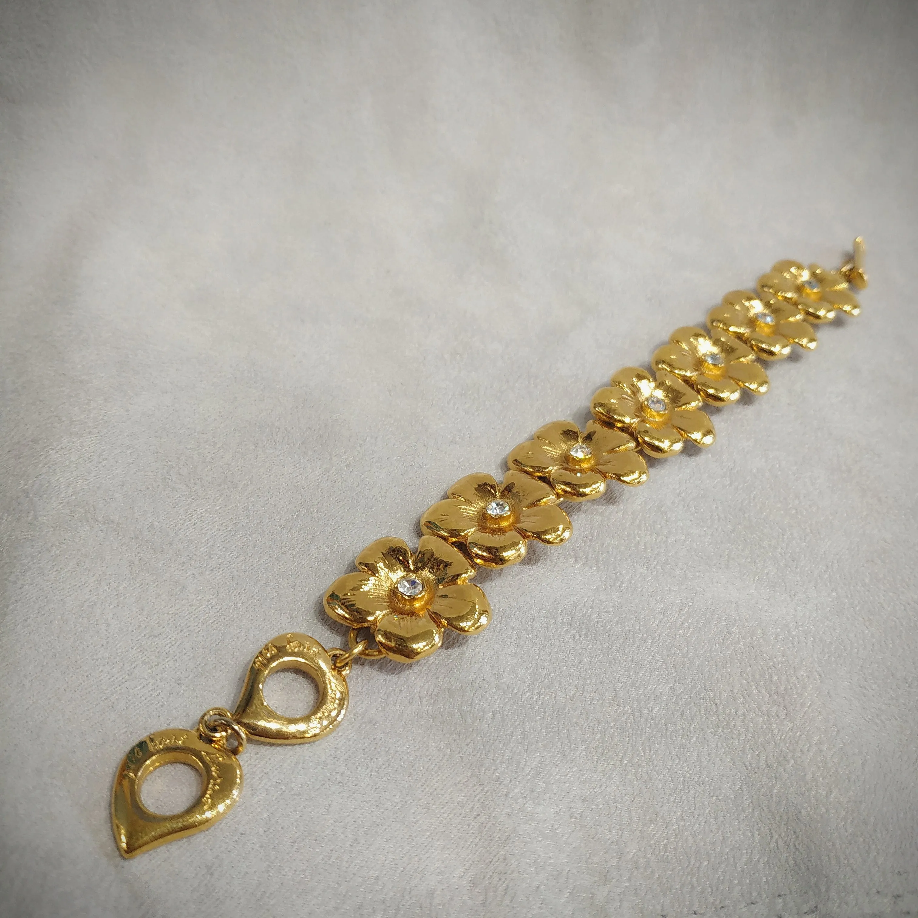 Yves Saint Laurent golden flower bracelet